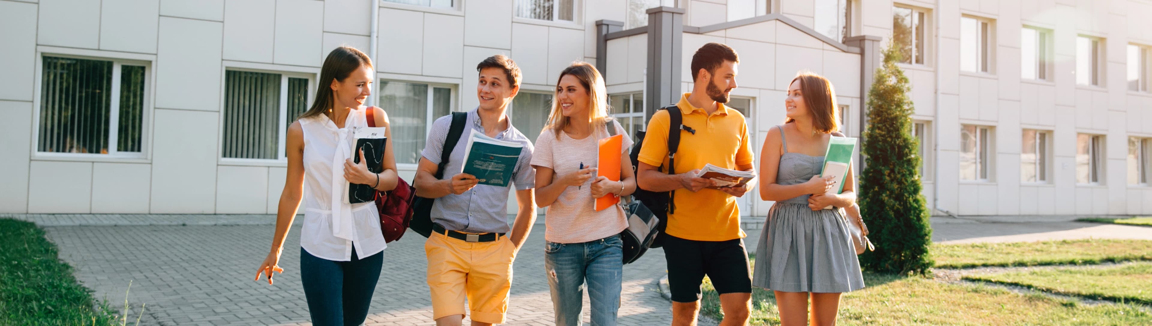 1764460742746-HERO-free-time-students-bachelor-s-campus-life-rhythm-five-friendly-students-are-walking.jpg