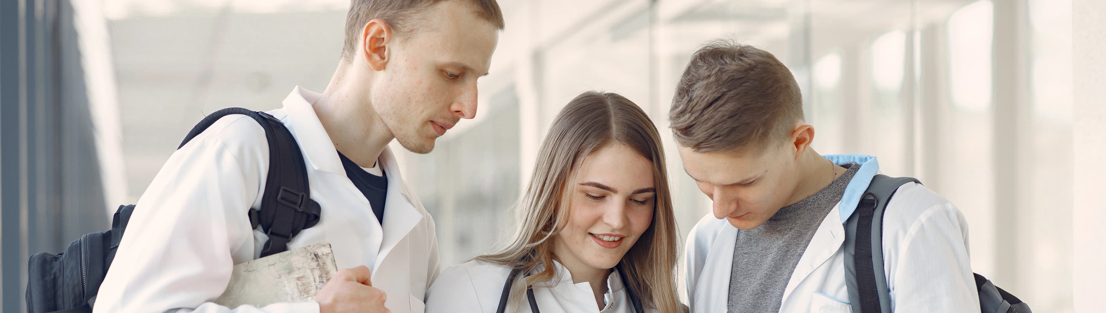 1764852455254-HERO-medical-students-are-hallway-talking.jpg
